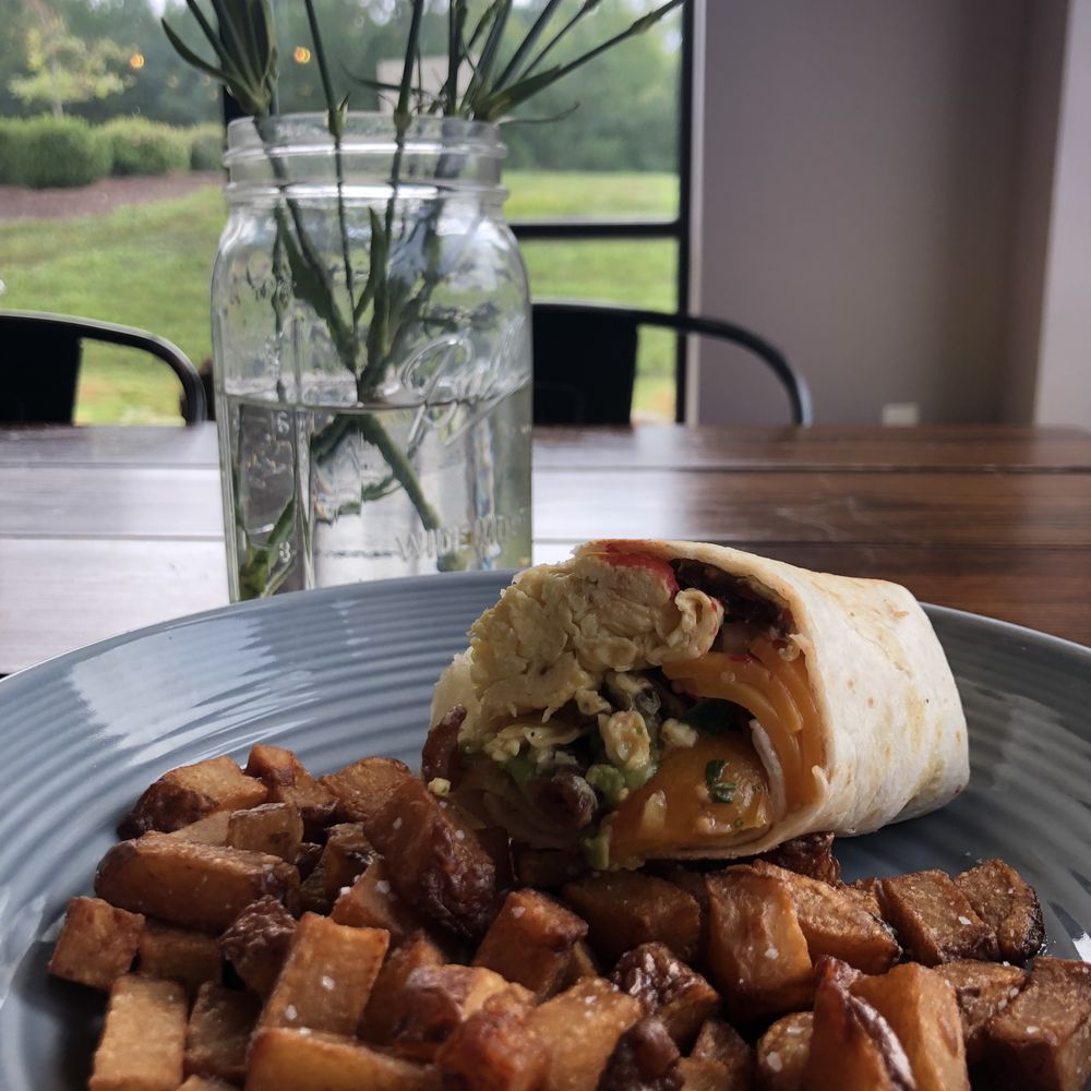 Breakaway Cafe - My half of the breakfast burrito - so so good. - Coffee & Tea Near Me - Chapel Hill, North Carolina