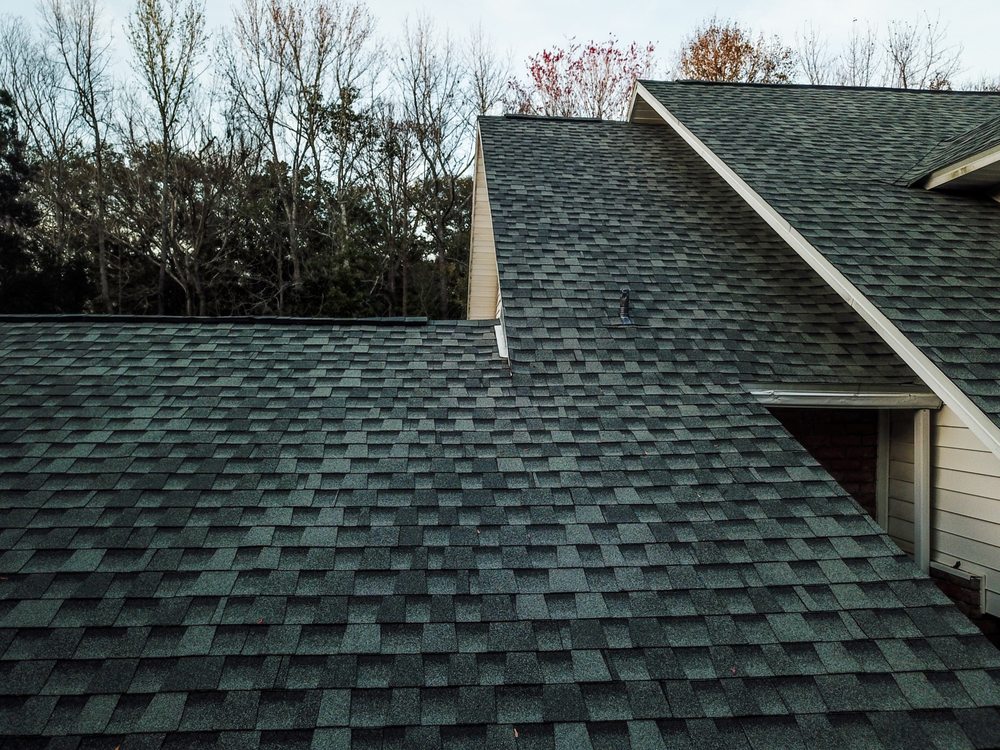 Slide of Action Roofing