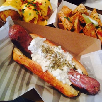 The Vanguard - Thee DVR (lamb sausage) with the potato balls and on the right the BEST tofu, ever! Try it you'll see! - Bars Near Me - Milwaukee, Wisconsin
