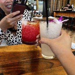 Pomegranate tequila mix and coconut sparkling drink