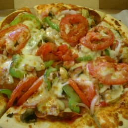 The Lonestar: Texas sized pepperoni, Canadian bacon, portobello mushrooms, green pepper, and tomato. The Lonestar: Texas sized pepperoni, Canadian bacon, portobello mushrooms, green pepper, and tomato.