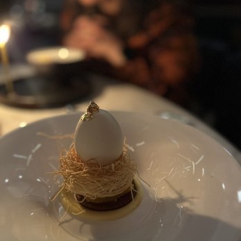 Peak with Priceless Restaurant & Bar - Egg (coconut mouse in an "egg"). Delicious - New American Near Me - New York, New York Peak with Priceless Restaurant & Bar - Egg (coconut mouse in an "egg"). Delicious - New American Near Me - New York, New York