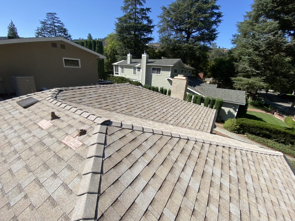 Slide of Green Shield Roofing