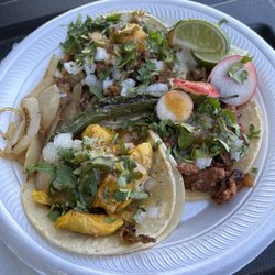 Tres Hermanos Taco Truck - Three amazing tacos: pollo, carnitas and and adobada.