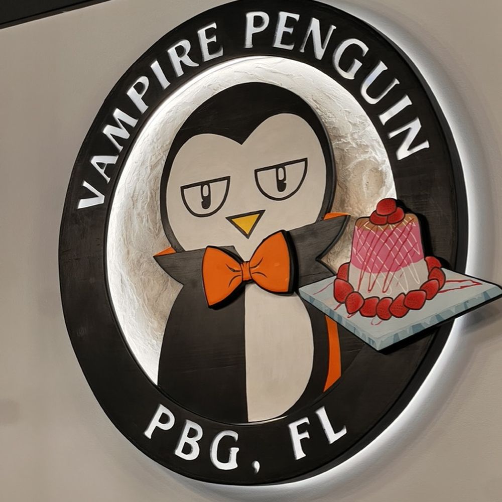 Vampire Penguin - logo/signage - Ice Cream & Frozen Yogurt Near Me - Palm Beach Gardens, Florida Vampire Penguin - logo/signage - Ice Cream & Frozen Yogurt Near Me - Palm Beach Gardens, Florida