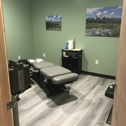 Accident and Injury Care - Flexion distraction chiropractic table for treating low back pain