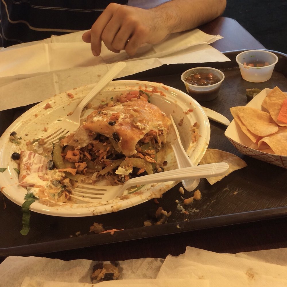 Vallarta Mexican Grill - The inside of the chicken fajita monster burrito with black beans. - Mexican Near Me - Hauppauge, New York Vallarta Mexican Grill - The inside of the chicken fajita monster burrito with black beans. - Mexican Near Me - Hauppauge, New York