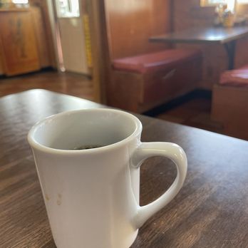 Mom's Country Deli - a cup of coffee on a table - Breakfast & Brunch Near Me - Houston, Texas Mom's Country Deli - a cup of coffee on a table - Breakfast & Brunch Near Me - Houston, Texas