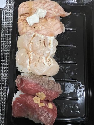 Kura Revolving Sushi Bar by null