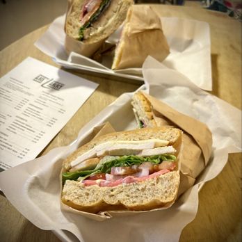 Ake'Larry - Turkey Breast (f) and Portobello Mushroom (r) sandwiches on house made foccacia. - Pasta Shops Near Me - Anaheim, California Ake'Larry - Turkey Breast (f) and Portobello Mushroom (r) sandwiches on house made foccacia. - Pasta Shops Near Me - Anaheim, California