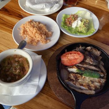 Tonati Tacos & Ritas - Mixed fajitas with charro beans - Mexican Near Me - Houston, Texas Tonati Tacos & Ritas - Mixed fajitas with charro beans - Mexican Near Me - Houston, Texas
