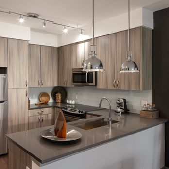 The Frasier - Upscale kitchens featuring sleek gray quartz countertops - Apartments Near Me - Alexandria, Virginia The Frasier - Upscale kitchens featuring sleek gray quartz countertops - Apartments Near Me - Alexandria, Virginia