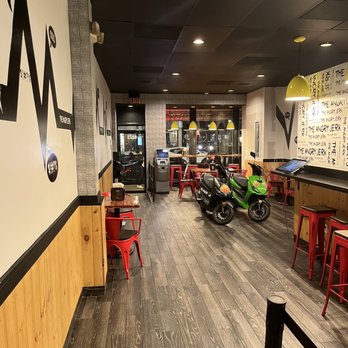 The Angry Jerk - a motorcycle parked in a restaurant - Caribbean Near Me - Silver Spring, Maryland