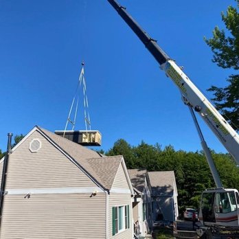 Veno Construction - a crane lifting a house - Septic Services Near Me Veno Construction - a crane lifting a house - Septic Services Near Me