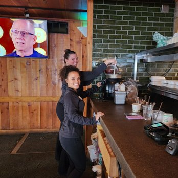 Junction Restaurant - 2 of the waitresses getting their meals from the cooks to be served. - Restaurants Near Me - Chesaning, Michigan