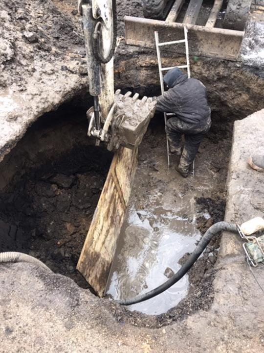 Slide of Suburban Sewer & Septic