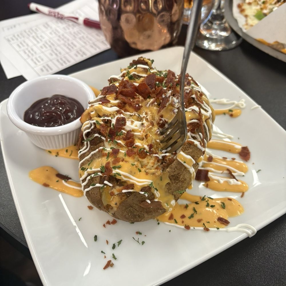 Prestyn’s Wine Bar - Full baked potato - Wine Tasting Room Near Me - Saint Joseph, Missouri Prestyn’s Wine Bar - Full baked potato - Wine Tasting Room Near Me - Saint Joseph, Missouri