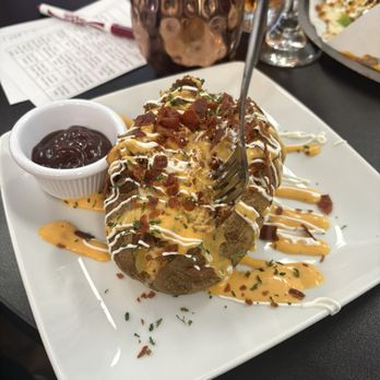 Prestyn’s Wine Bar - Full baked potato - Wine Tasting Room Near Me - Saint Joseph, Missouri Prestyn’s Wine Bar - Full baked potato - Wine Tasting Room Near Me - Saint Joseph, Missouri
