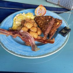 Lighthouse Cove Tiki Bar - Bacon, eggs, tater tot, crunchy French toast
