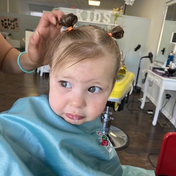 Let Hair Go - Baby girl getting hair styled - Hair Salons Near Me - Riverside, Illinois