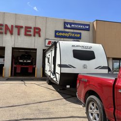 BLAIN'S FARM & FLEET - Ottawa, IL - Our Surveyor travel trailer for new tires mounted and balanced