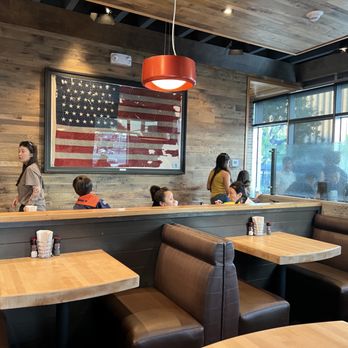 Hook Burger - a group of people in a restaurant - Burgers Near Me - Pasadena, California
