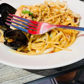 Trattoria Mercatto - a plate of pasta and musselling - Italian Near Me - Toronto, Ontario Trattoria Mercatto - a plate of pasta and musselling - Italian Near Me - Toronto, Ontario