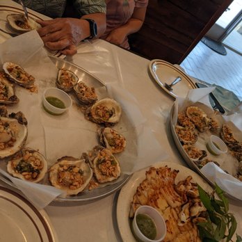 Black Pearl - Grilled oysters w/ onion and peanuts - Seafood Near Me - Katy, Texas Black Pearl - Grilled oysters w/ onion and peanuts - Seafood Near Me - Katy, Texas