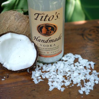 Bird Mountain Wine & Spirits - a bottle of tito's handmade vodka and coconut flakes - Beer, Wine & Spirits Near Me - Landrum, South Carolina Bird Mountain Wine & Spirits - a bottle of tito's handmade vodka and coconut flakes - Beer, Wine & Spirits Near Me - Landrum, South Carolina