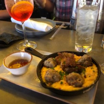 Canvas - Spicy Pork Meatballs with honey on the side - New American Near Me - Orlando, Florida Canvas - Spicy Pork Meatballs with honey on the side - New American Near Me - Orlando, Florida