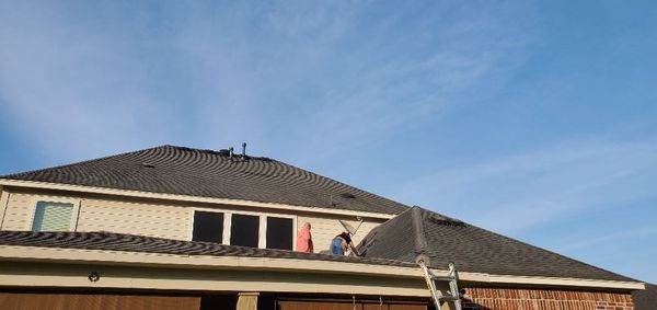 Reveille Roofing Logo