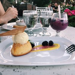 Bacchus Lounge - Lemon cake with olive oil gelato and blackberries, with the Yummy drink.