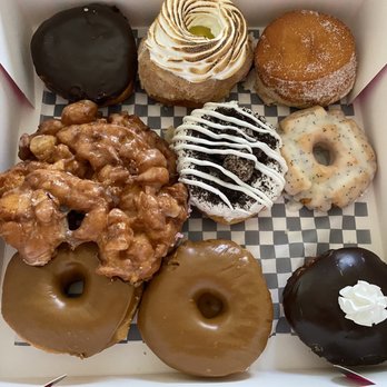 Wicked Donuts - Boston Creme,Lemon Meringue Pie, Strawberry Filled, Apple Pear, Cookies & Cream, Lemon Poppy, Maple Iced x 2, and Chocolate Banana Boat - Donuts Near Me - Las Vegas, Nevada
