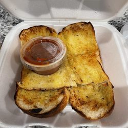 Pizza Palace - Order of garlic bread with marinara sauce