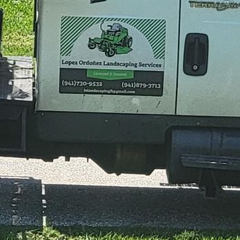 Lopez Ordonez Landscaping Services - a white truck parked on the side of the road - Landscaping Near Me