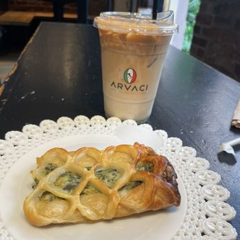 Arvaci coffee - Spinach and Feta Croissant and iced vanilla latte - Coffee & Tea Near Me - New York, New York Arvaci coffee - Spinach and Feta Croissant and iced vanilla latte - Coffee & Tea Near Me - New York, New York