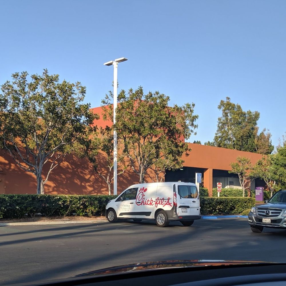 Chick-fil-A - Omg, the drive thru line drives me crazy! 4 car lengths of open space. Line was backed up to the street causing a traffic jam. - Fast Food Near Me - Irvine, California