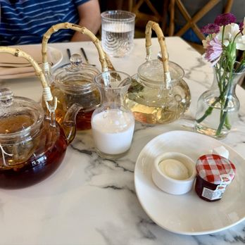 Tea Modern Chinese - Table of tea (passionfruit jasmine, Darjeeling, and blooming tea) - Tea Rooms Near Me - Orange, California