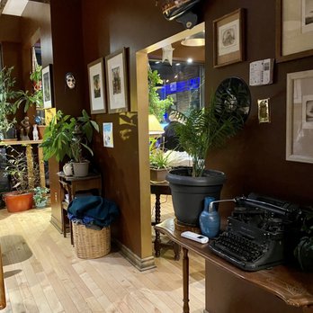 Anticafé - a wooden table with a typewriter on it - Coffee & Tea Near Me - Montreal, Quebec Anticafé - a wooden table with a typewriter on it - Coffee & Tea Near Me - Montreal, Quebec