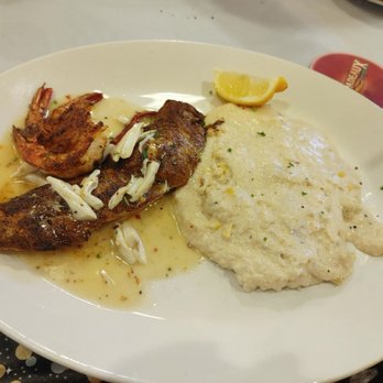 Pappadeaux Seafood Kitchen - Grouper with lump crab, grits and butter - Cajun/Creole Near Me - Springdale, Ohio Pappadeaux Seafood Kitchen - Grouper with lump crab, grits and butter - Cajun/Creole Near Me - Springdale, Ohio