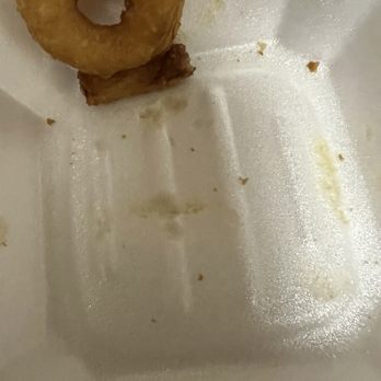 Cheesesteaks - Onion rings- the yellow is the melted Styrafoam - Cheesesteaks Near Me - Sacramento, California