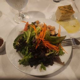 Salad with the house dressing on the side. House dressing was ok, kinda sweet...reminds me of italian Salad with the house dressing on the side. House dressing was ok, kinda sweet...reminds me of italian