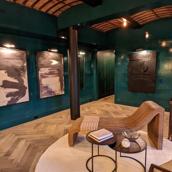 Iconic Interior Installations - Artwork hung on high end paneled walls - Handyman Near Me