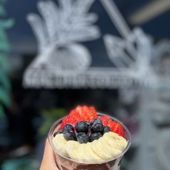 Pastele House Maui - a hand holding a dessert - Food Trucks Near Me - Wailuku , Hawaii Pastele House Maui - a hand holding a dessert - Food Trucks Near Me - Wailuku , Hawaii