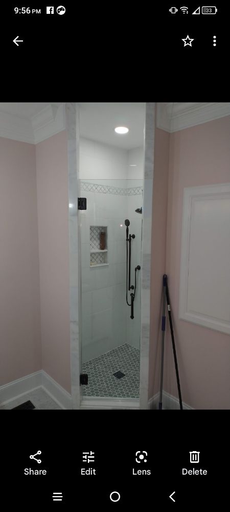 Slide of Bathmatic Custom Tile and Shower