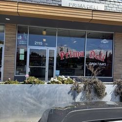 Prima Deli - Closed 12 minutes early, full counter force behind the deli. Customers are not welcome in and they wouldn't even come to the door.