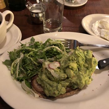 The Smith - Avocado toast, two poached eggs on the side. - New American Near Me - New York, New York The Smith - Avocado toast, two poached eggs on the side. - New American Near Me - New York, New York