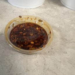 Half container of chili oil Half container of chili oil