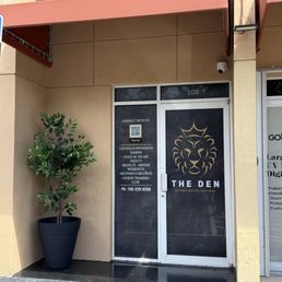 Exterior outside entrance of The Den Cafe - Entrance - Miami, Florida Exterior outside entrance of The Den Cafe - Entrance - Miami, Florida