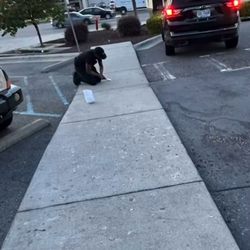 Cook Out - Racist employer forcing Young Black Man to scrape gum off public sidewalk for pay while his white racist co-workers laughed